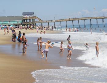 Kill Devil Hills Beach filled with vacationers on Independence Day.