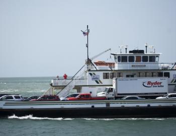 Passing a Hatteras/Ocracoke Ferry with commercial vehicles on board.