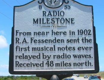 Sign telling the story of Reginald Fessenden's wireless radio signal.