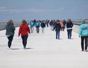 Pedestrians took to the Jug handle Bridge in Rodanthe for a one time chance to walk the bridge.