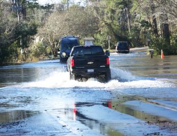 Kitty Hawk Road, just before the Kitty Hawk Police Department closed it at 1:35.