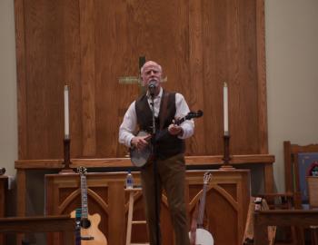 John McCutcheon performed with banjo and assorted other instruments.