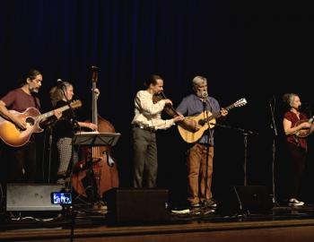 Molasses Creek on stage at First Flight High School in Kill Devil Hills.