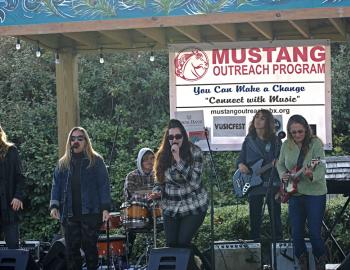 Mustang Outreach kids jamming with the pros and rocking out to Proud Mary.