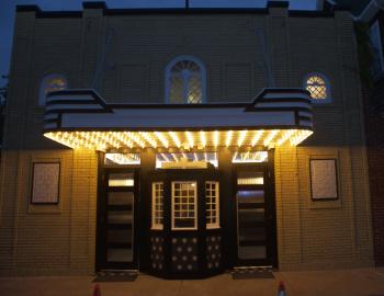 The new facade of the Pioneer Theater returns the building's look to its original design.
