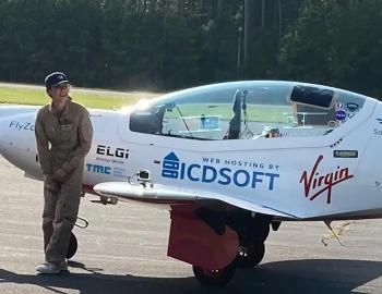 Zara Rutherford with her aircraft at Wright Brothers Memorial Airport. Photo Mark Jurkowitz, Outer Banks Voice.