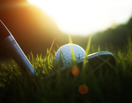 close up of golf ball on a tee