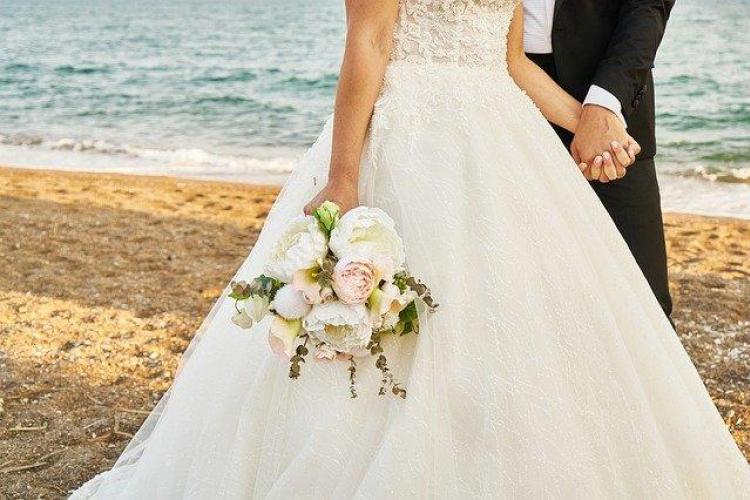 bride and groom on beach on the outer banks