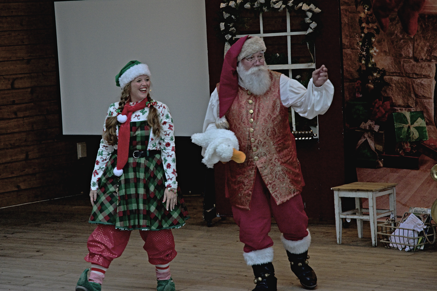 Duck Santa Clause greets children at the Village of Duck Crab Pot Lighting ceremony.