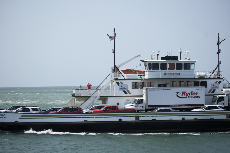 Passing a Hatteras/Ocracoke Ferry with commercial vehicles on board.