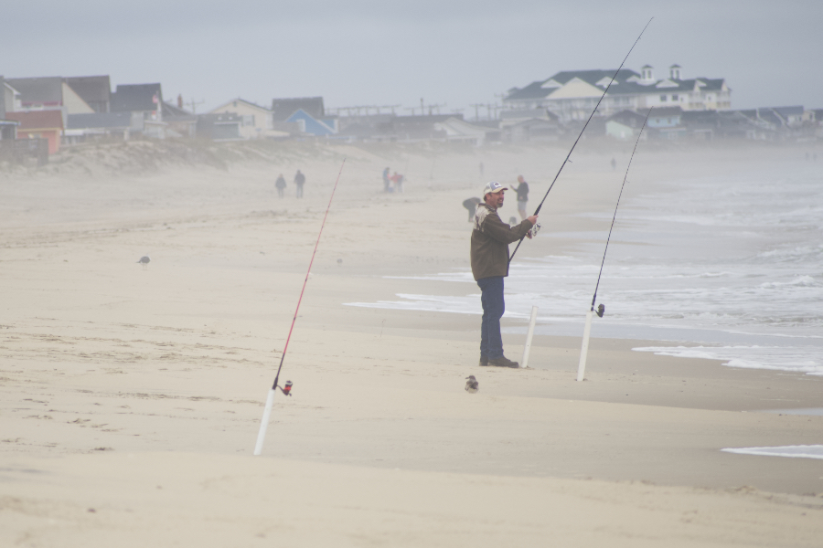 Fishing for sea mullet or whatever grabs the bait on an Outer Banks beach.