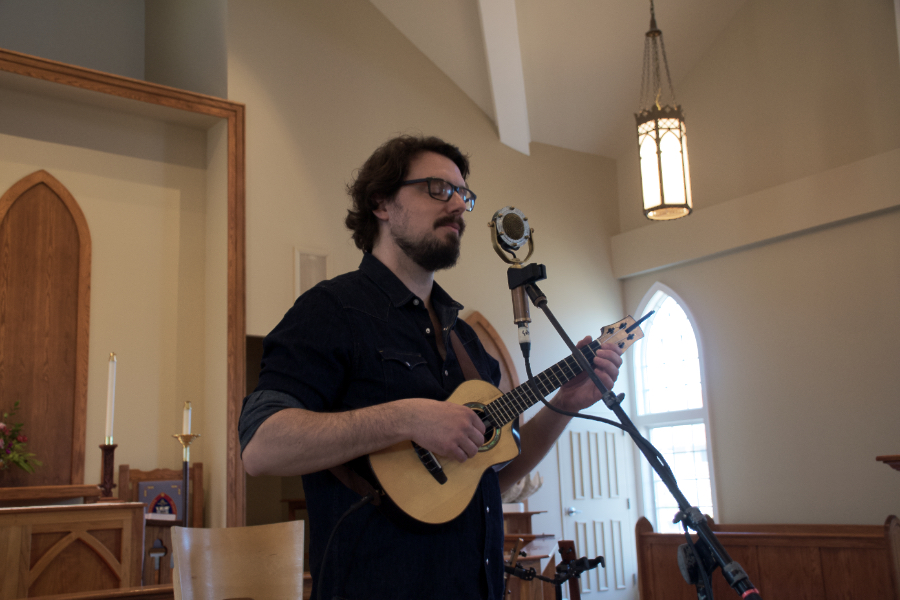 James Hill performing on his ukulele at St. Andrews by the Sea in Nags Head.