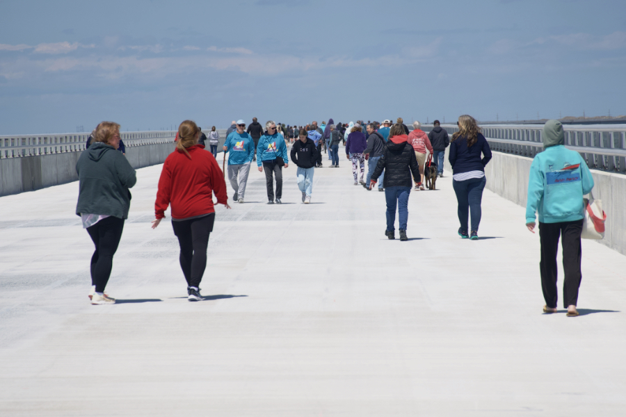 Pedestrians took to the Jug handle Bridge in Rodanthe for a one time chance to walk the bridge.