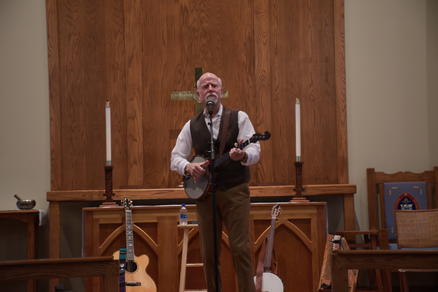 John McCutcheon performed with banjo and assorted other instruments.