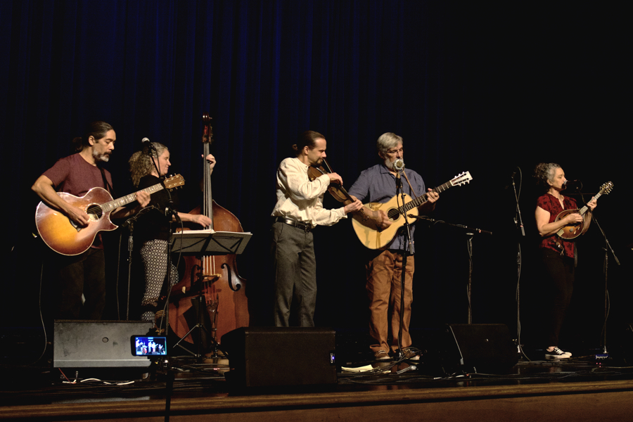 Molasses Creek on stage at First Flight High School in Kill Devil Hills.