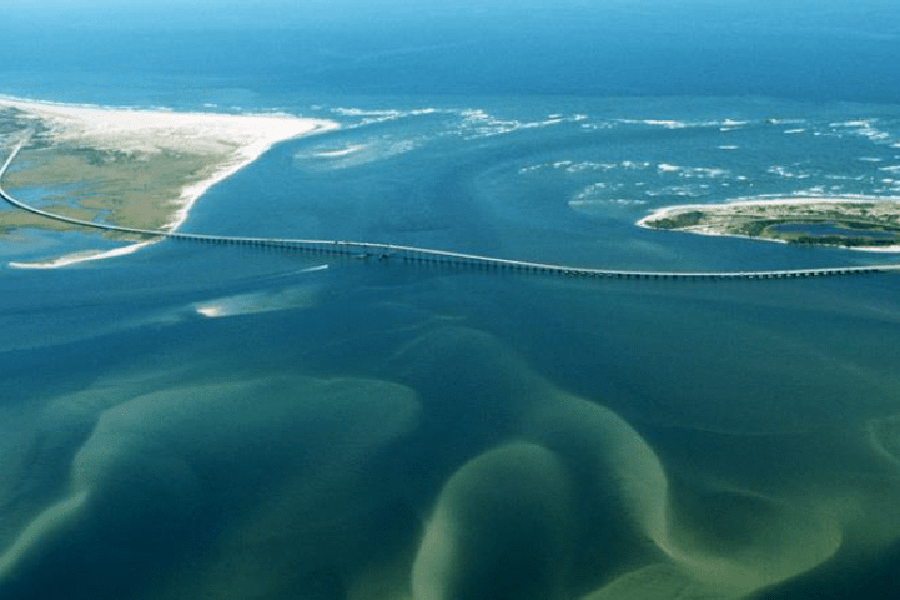 Oregon Inlet with the Marc C. Basnight Bridge.