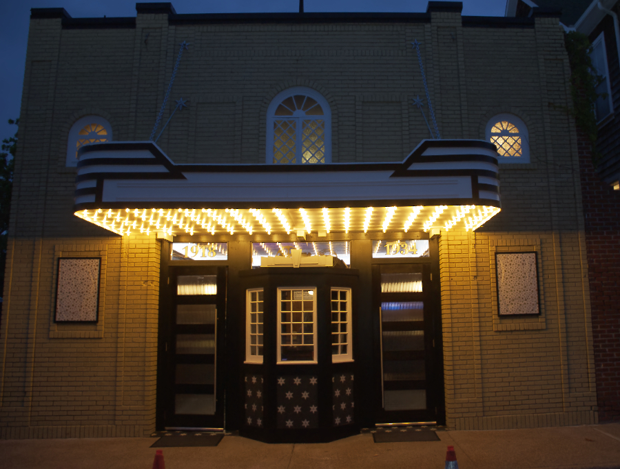 The new facade of the Pioneer Theater returns the building's look to its original design.
