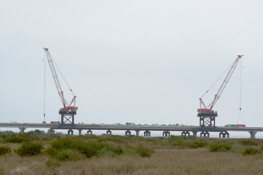 Work crews are finishing construction on the Jug Handle Bridge on Pea Island.