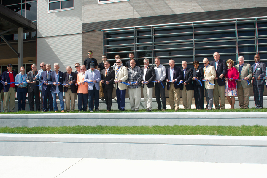 All hands on deck as some 30 key people cut the ribbon on the new COA Dare County Campus.