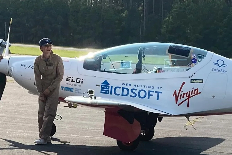 Zara Rutherford with her aircraft at Wright Brothers Memorial Airport. Photo Mark Jurkowitz, Outer Banks Voice.