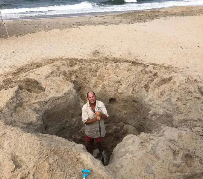 Dave Elder, Kill Devil Hills Ocean Rescue Director, in 7' sandpit.
