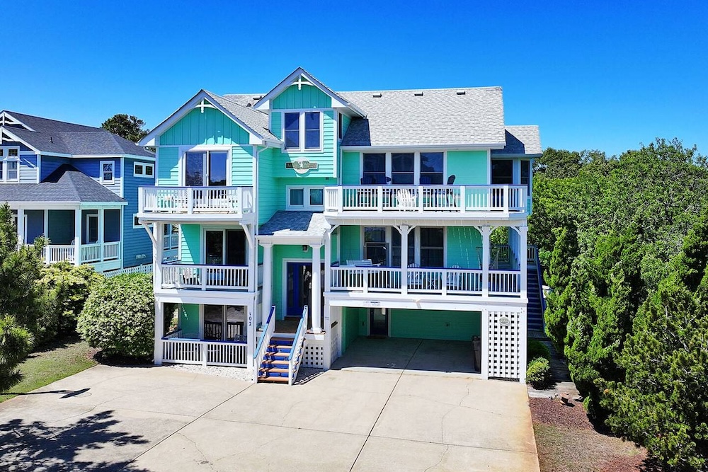 teal colored vacation rental in the outer banks 
