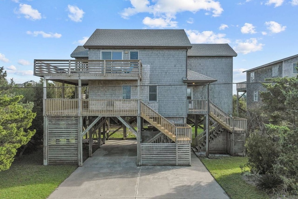 Exterior view of cedar shake vacation rental on Hatteras Island