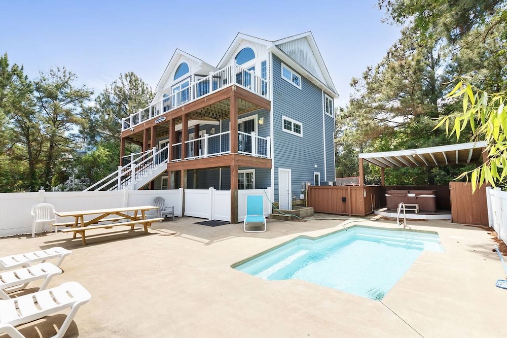 outer banks vacation rental with view of private pool