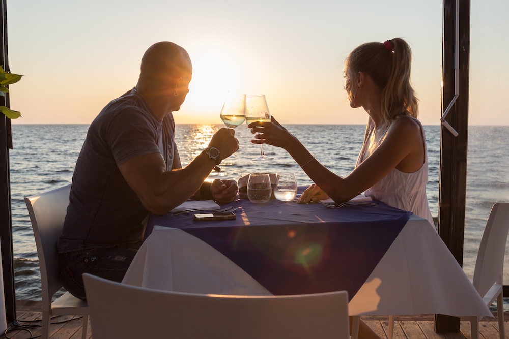couple at waterfront restaurant 