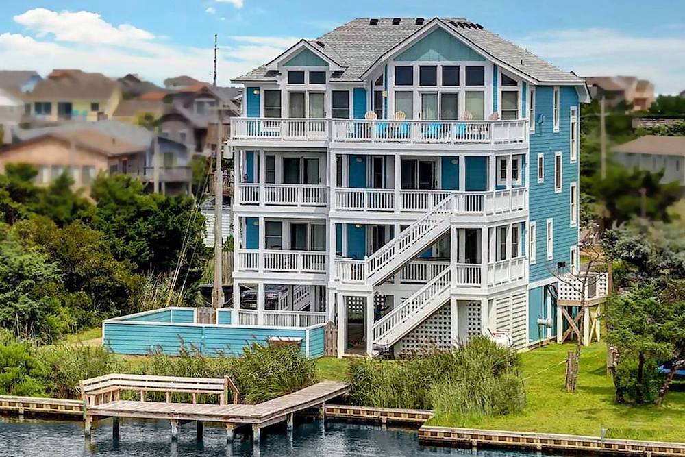 exterior view of hatteras island home and canal