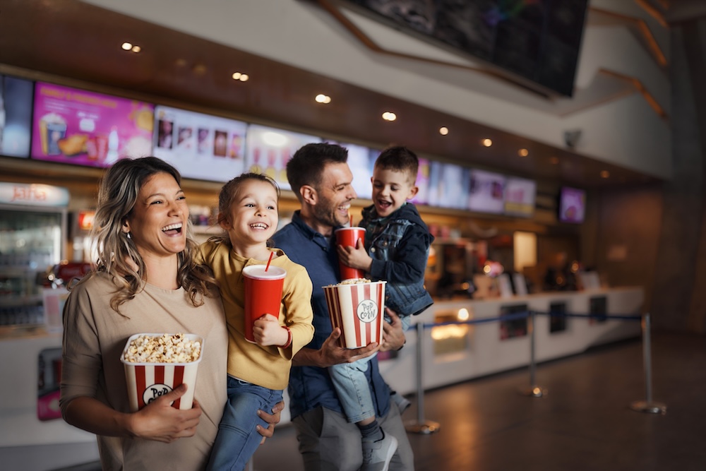 family at movie theater