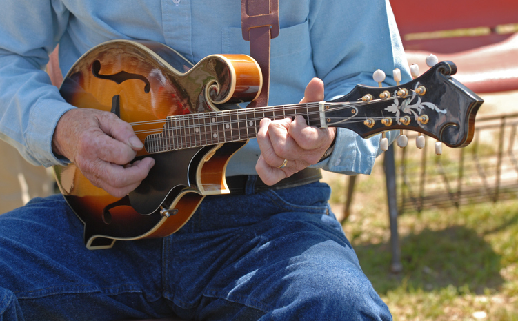 A musician plays at the Bluegrass Island Festival